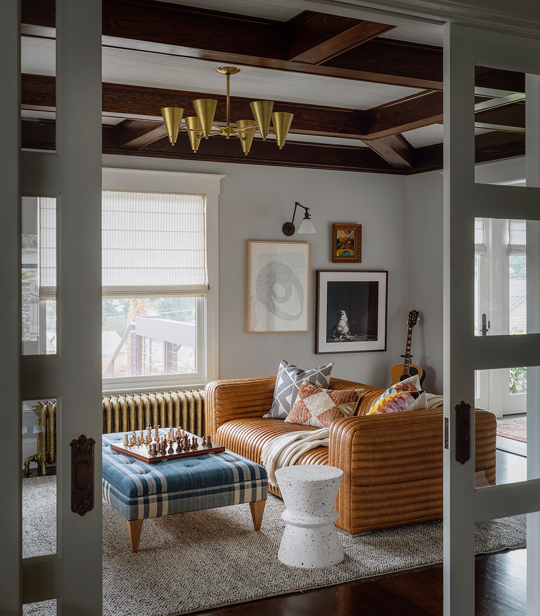 leather sofa and blue ottoman