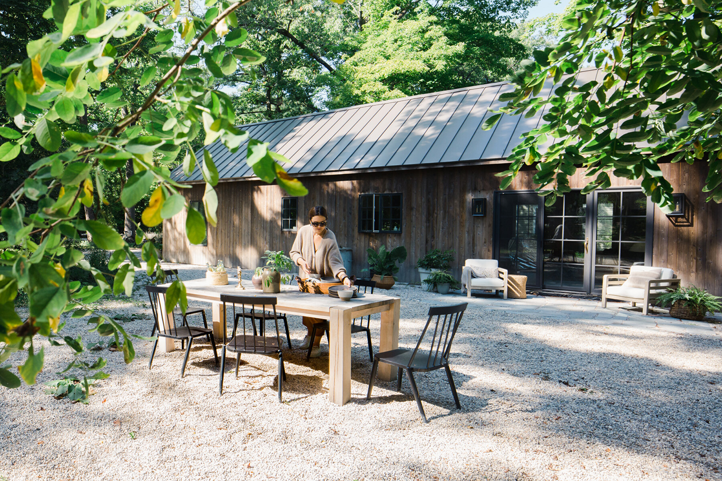 exterior of the wooden house, dinijntable and chairs