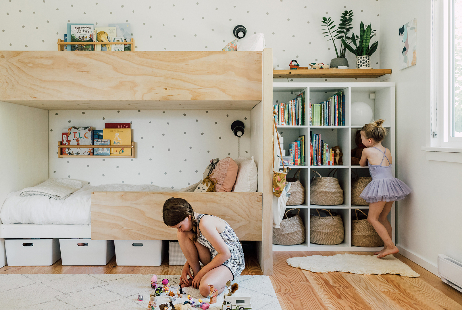 girls playing in bunk bed room