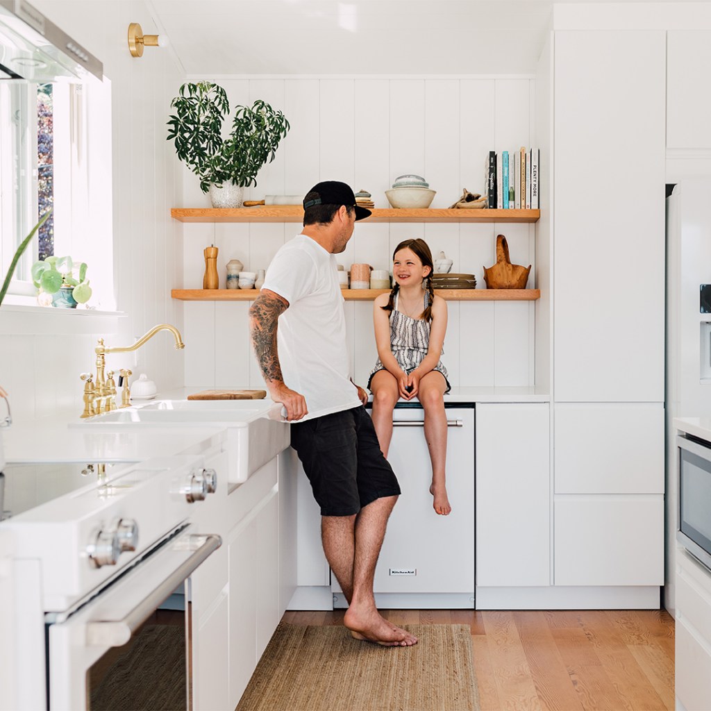 father and daughter in kitchen