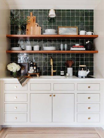 Green Glossy Tile Backsplash in White Kitchenette