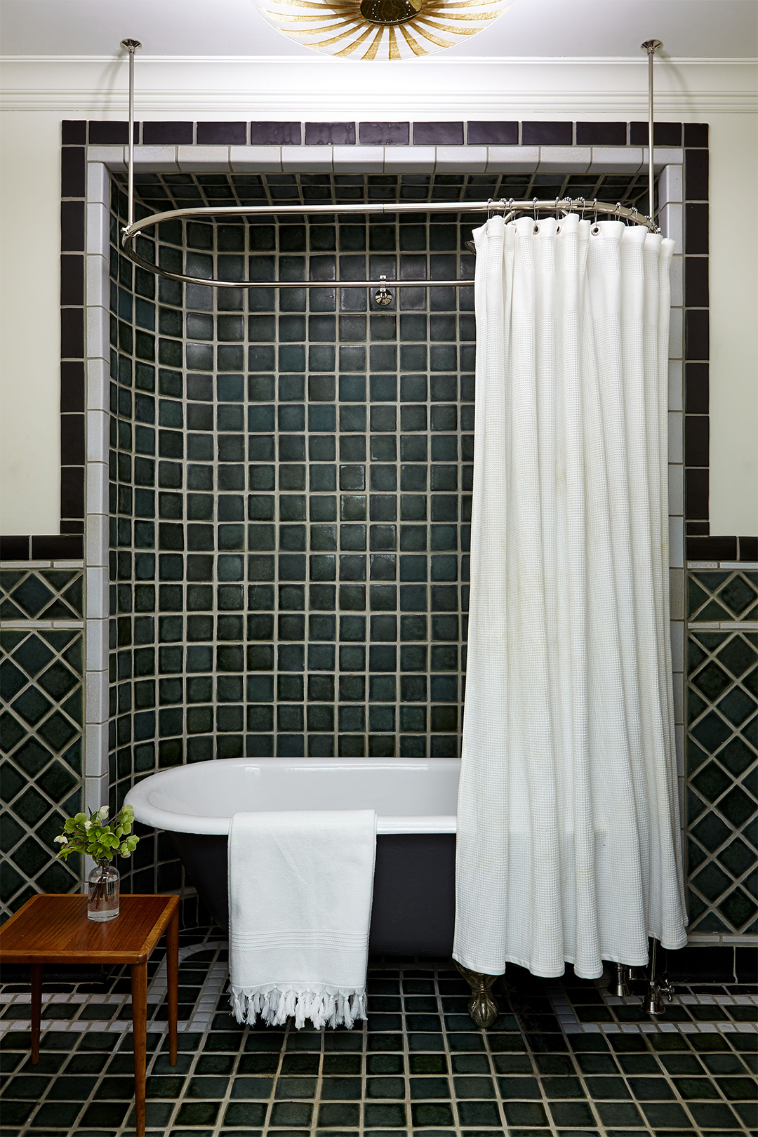 green tiled bathroom