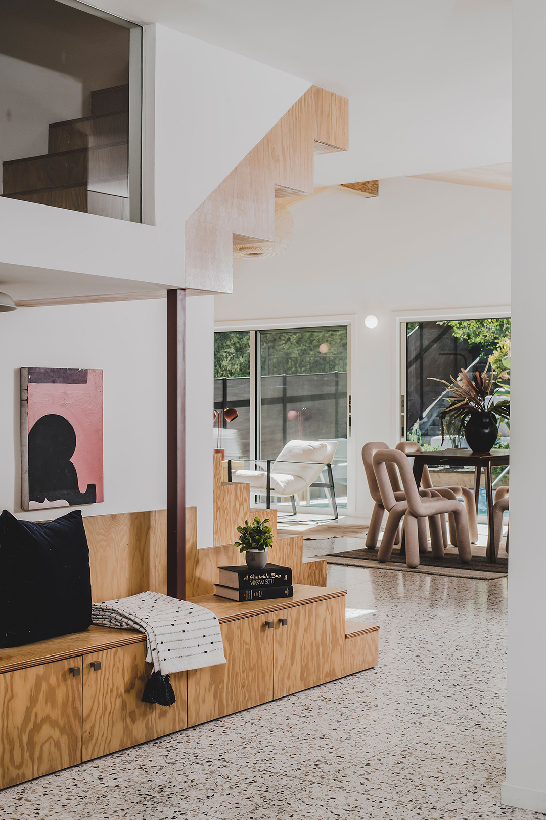 wood bench by stairs