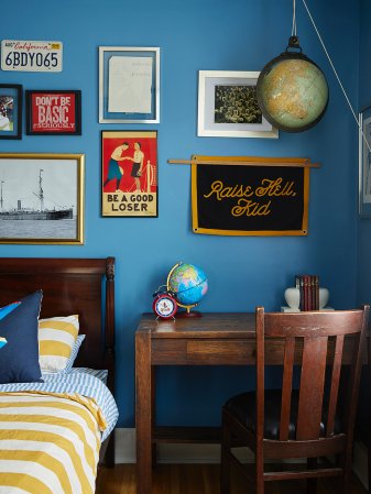 wood desk next to bed