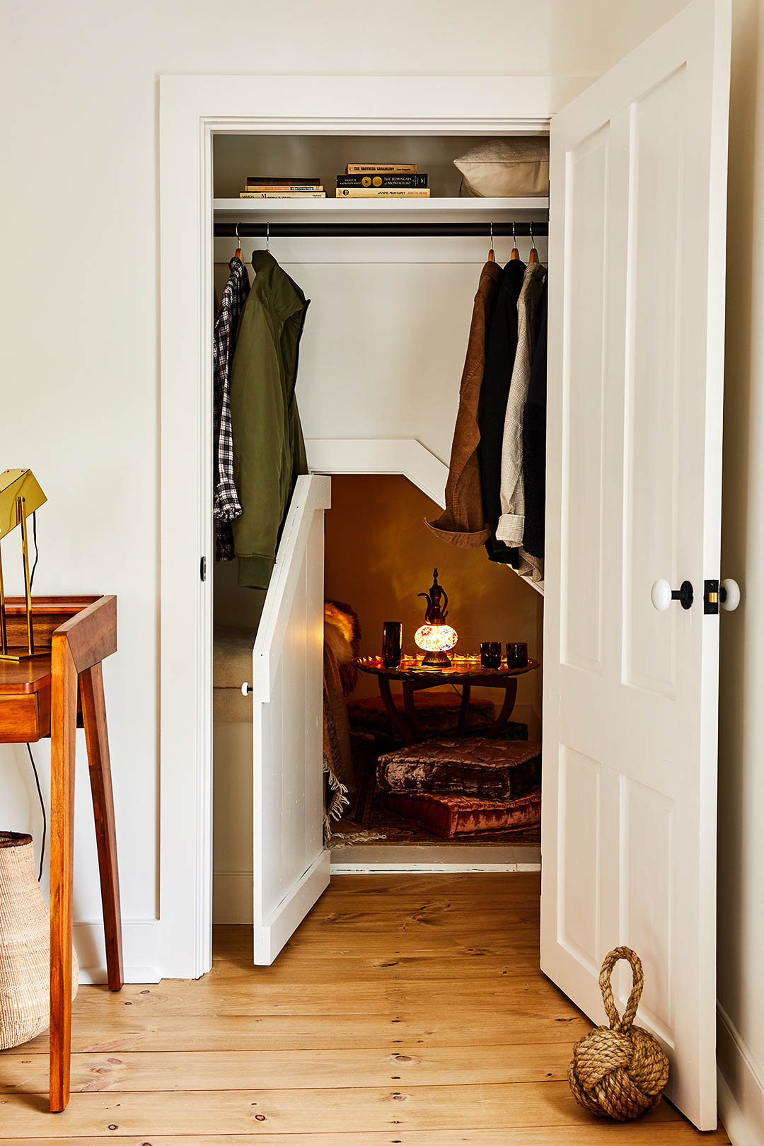 coat closet with hidden nook