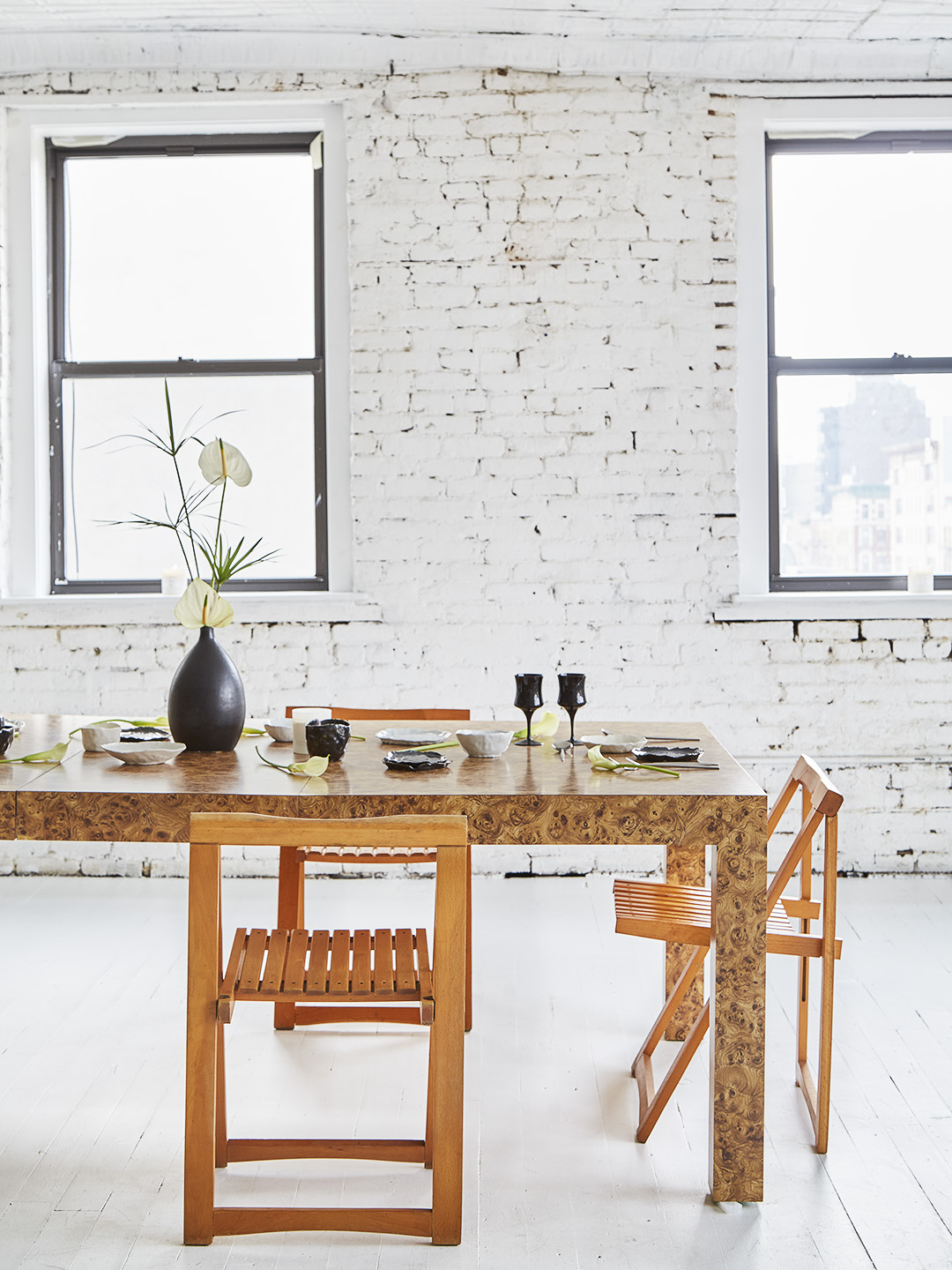 wood table in white loft room