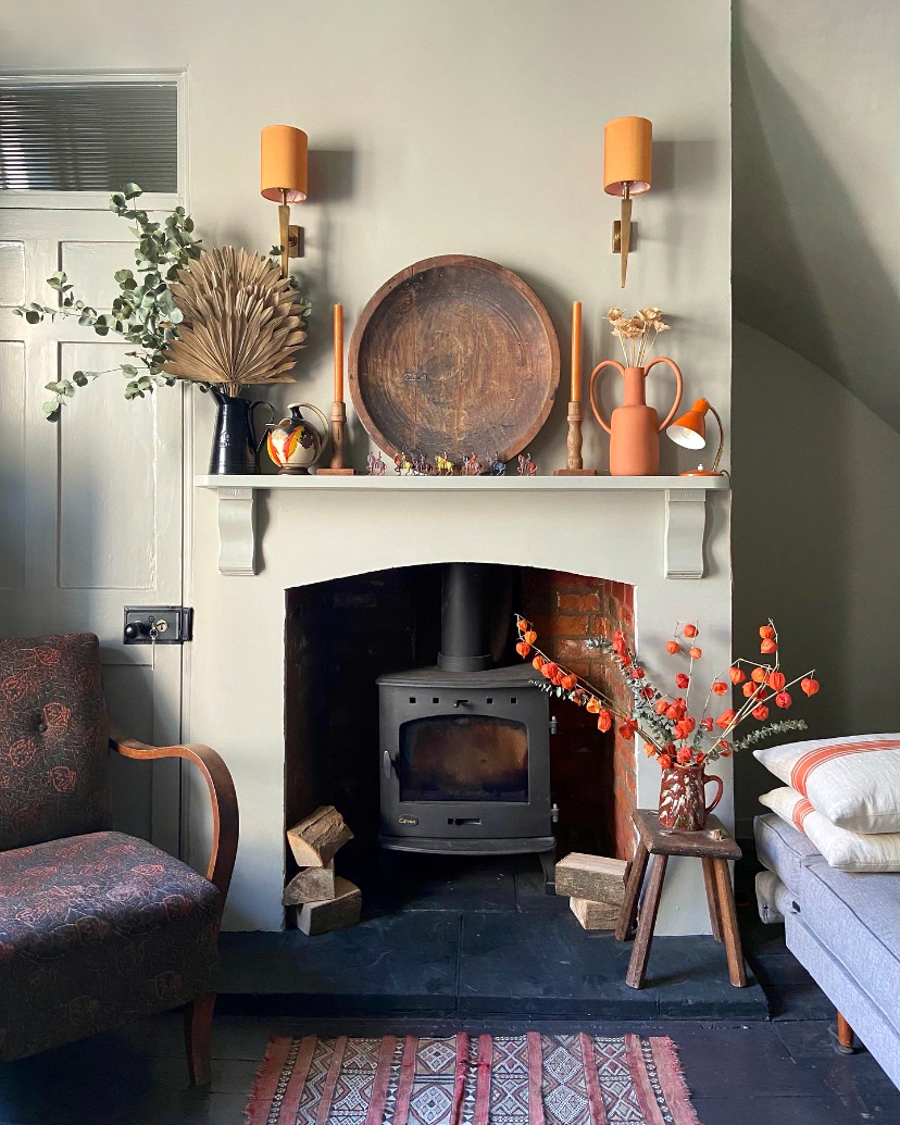 living room with wood burning fireplace