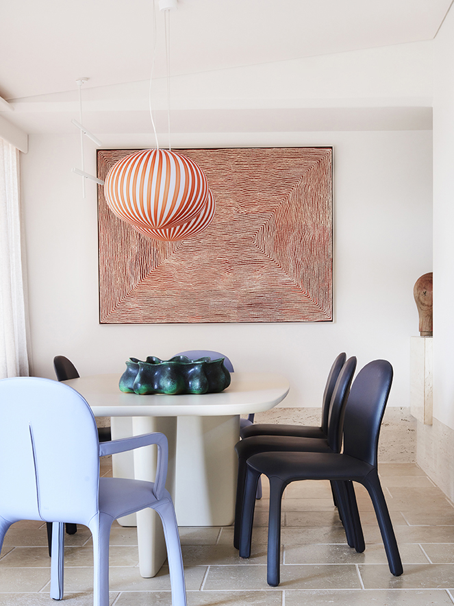 dining room with red artwork