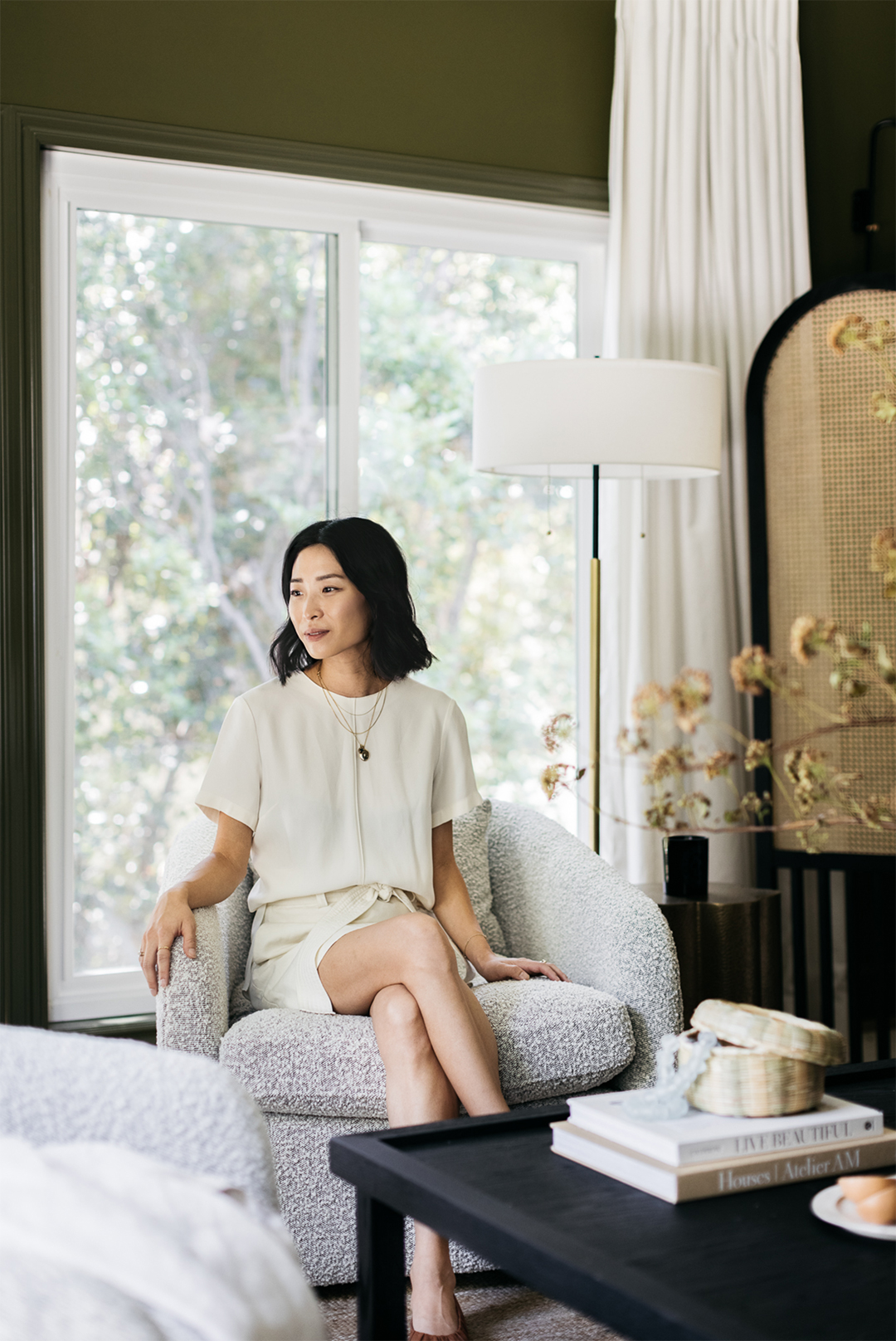 portrait of woman on a fuzzy chair