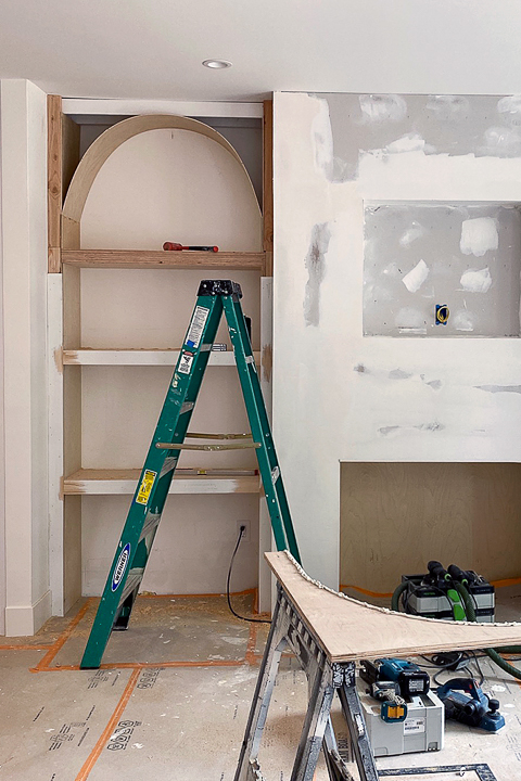 ladder next to bookshelf