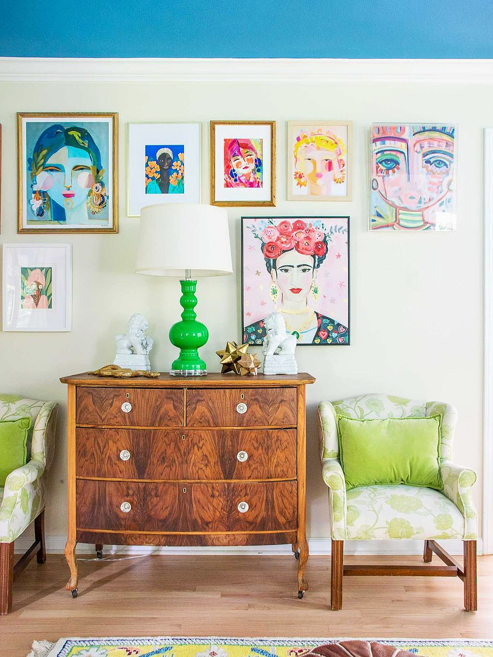 wooden dresser with design objects on top