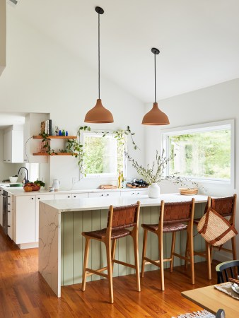 green and white kitchen peninsula