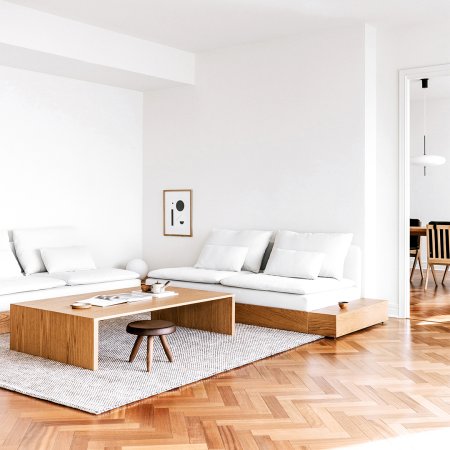 living room with white platform sofa