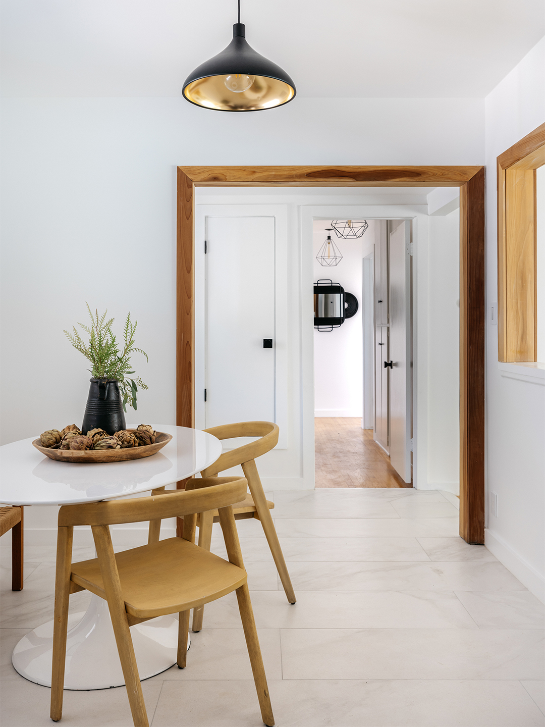 wood lined entryway to the kitchen