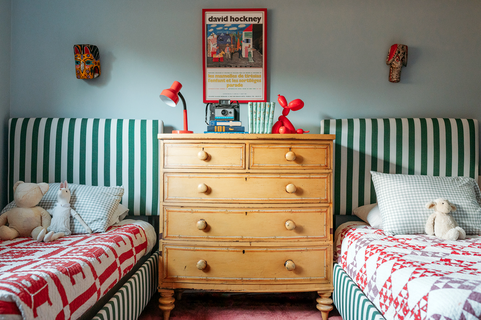 bedroom with two striped twin beds