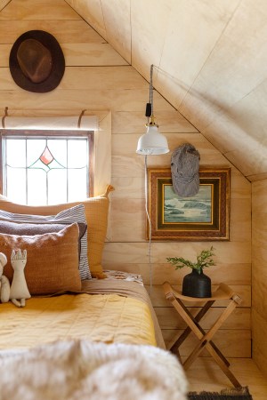 wood-paneled kids room nook