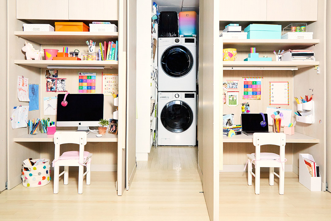 basement laundry room with desks