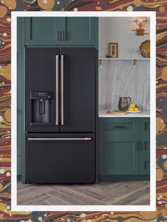 Counter-Depth Fridge in Green Kitchen with Marble Backsplash