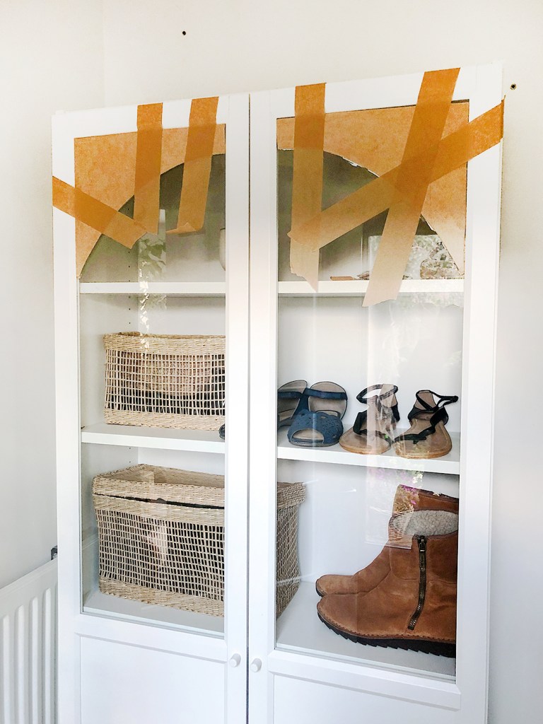 wood attached to top of bookcase