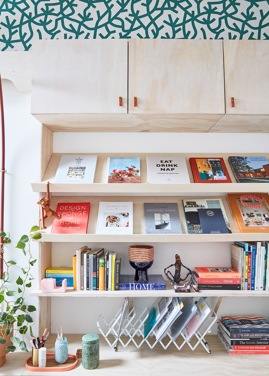 books propped up on flat lege