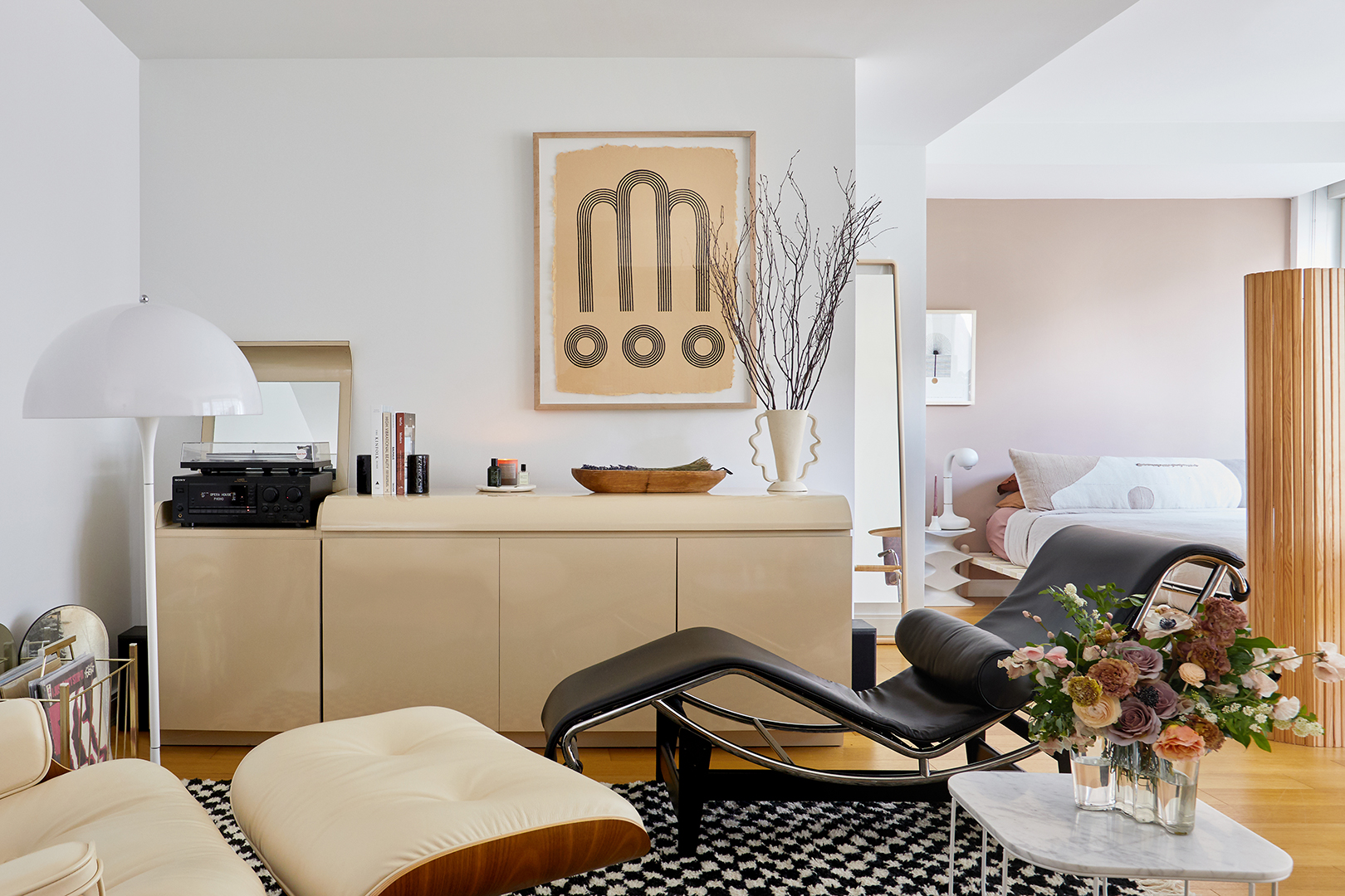 Small Living Room with Credenza and Record Player and Two Lounge Chairs