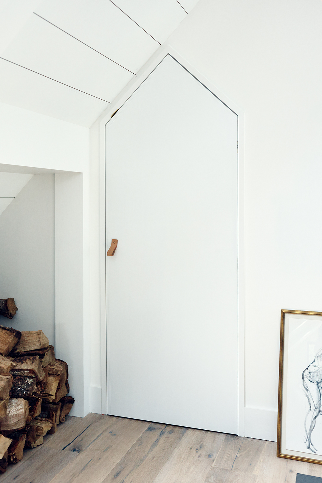 White pantry door with leather handle