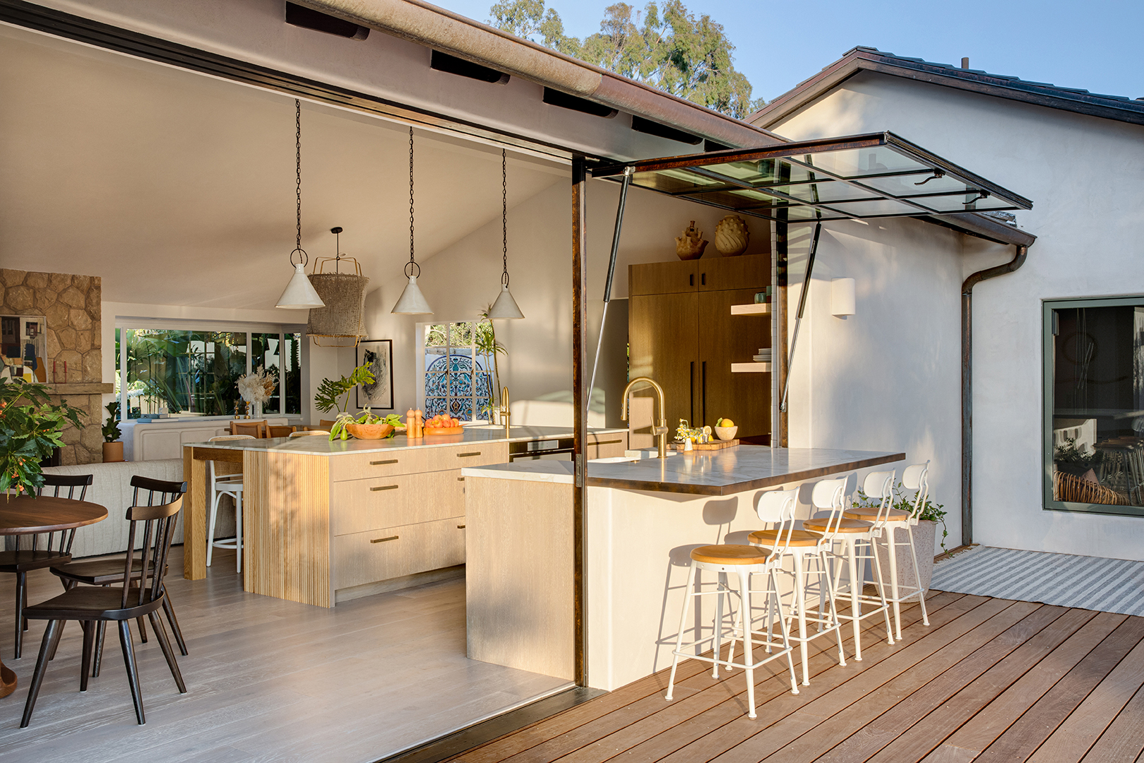 Kitchen with sliding glass door and garage window