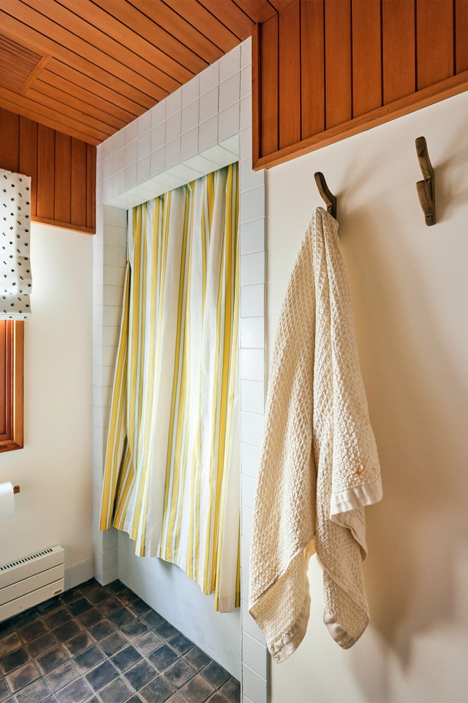 stripe curtain in front of shower