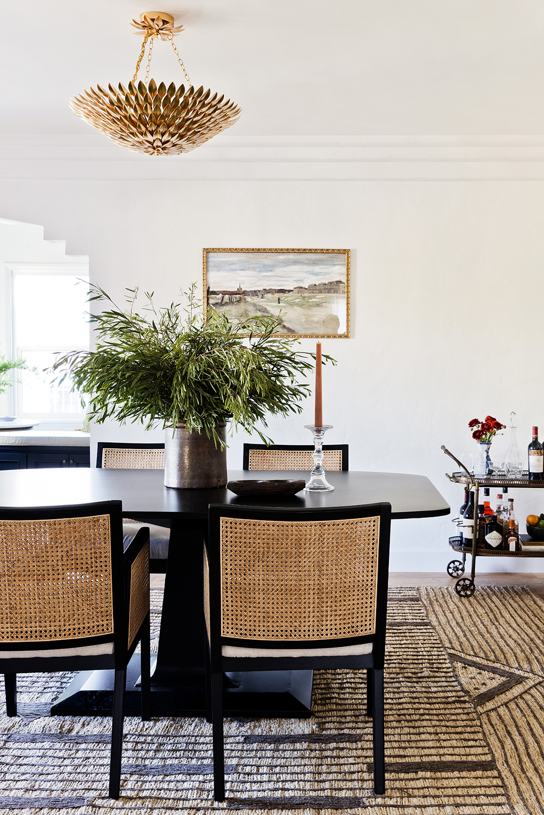 Dining room with dark colored furniture.