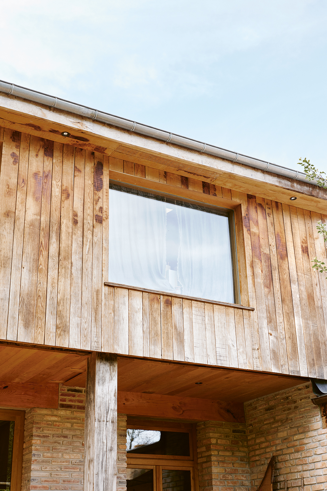 wood exterior of a house with square window