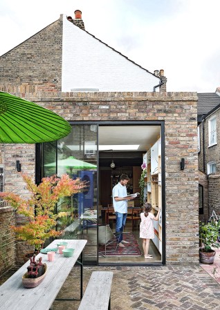 modern brick home with sliding door