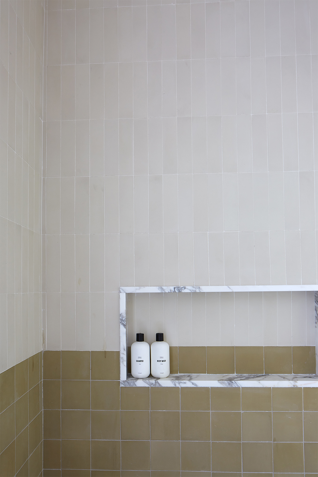 marble lined shower niche