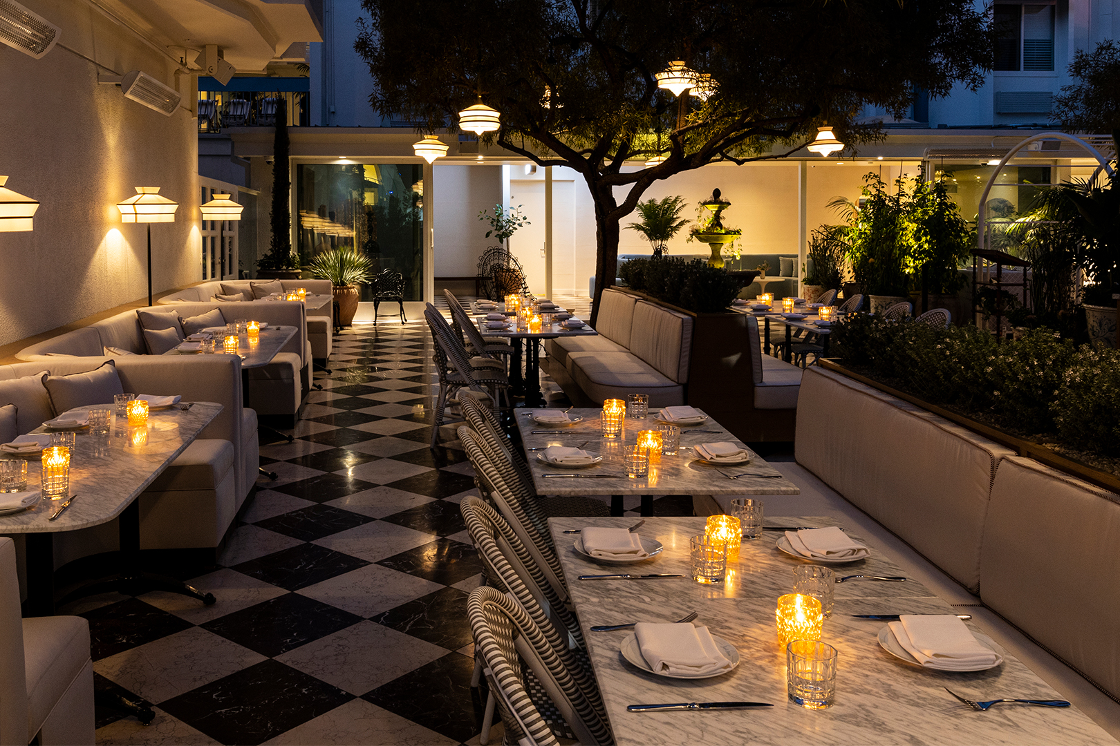 Pendant lights and table lights on at night