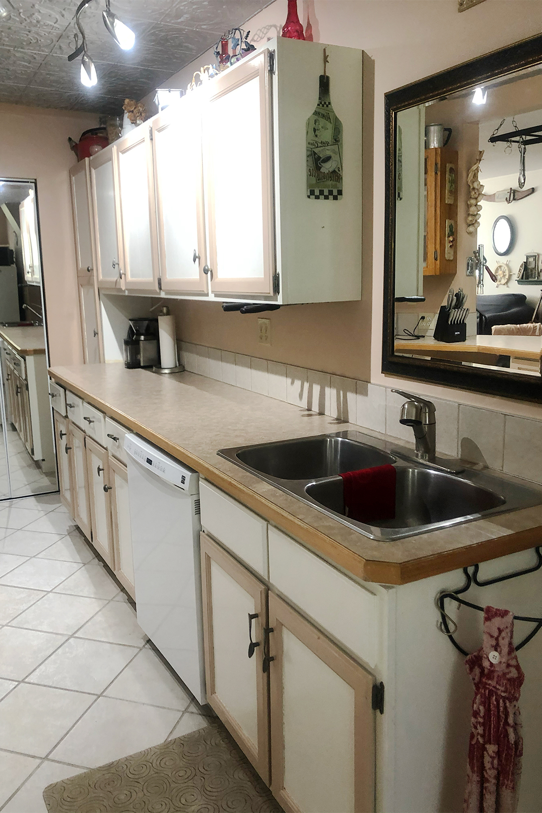 dated white basement kitchen