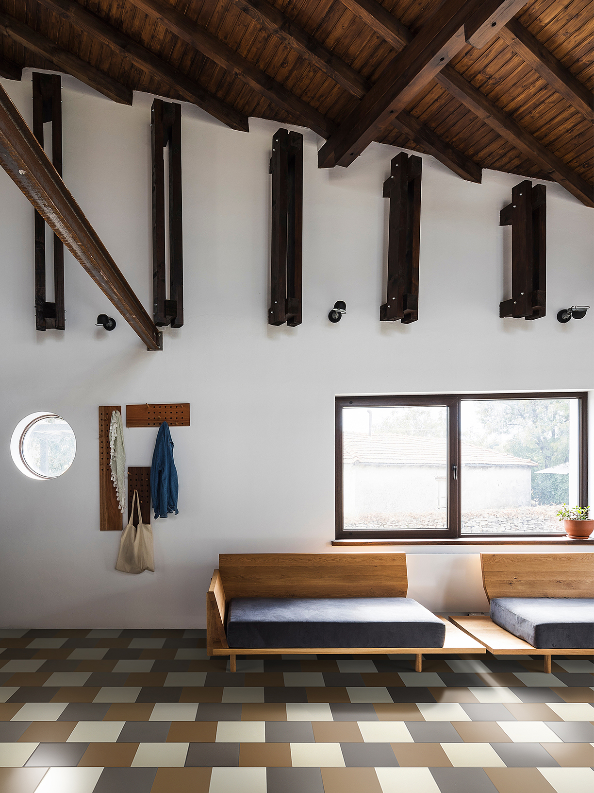 living room with brown and white tiled floor