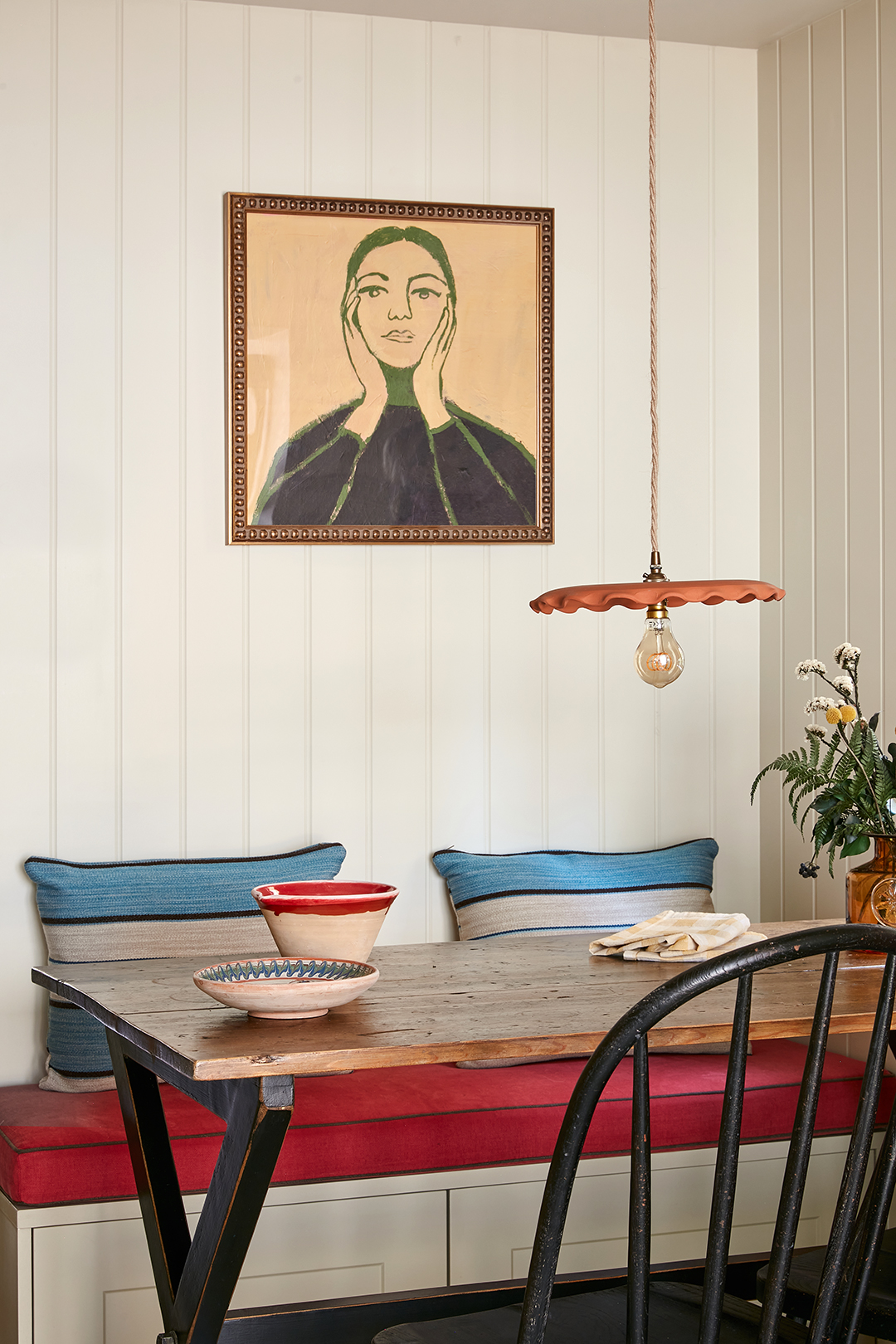 red cushion on banquette