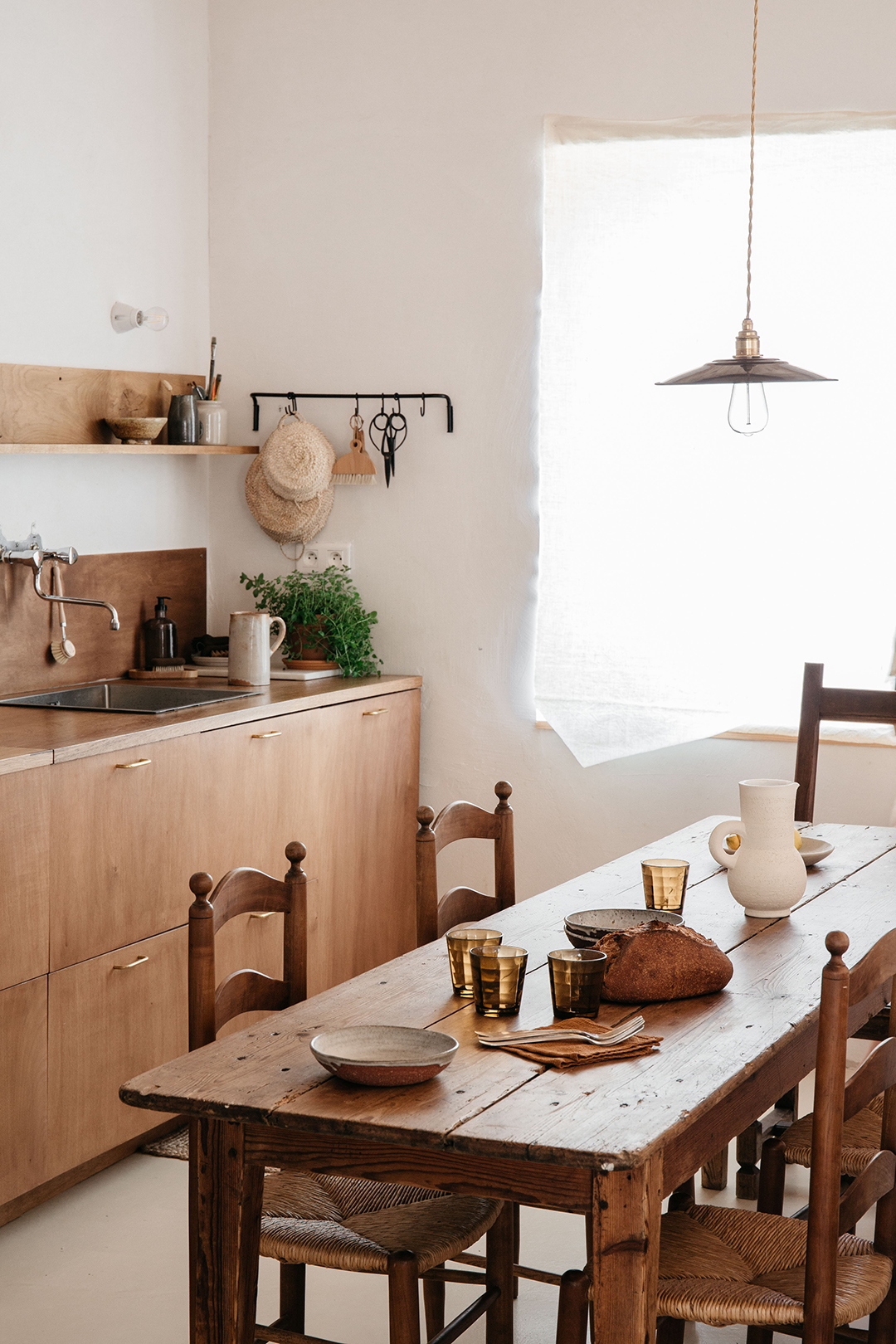 Close shot of kitchen table and cabinets 