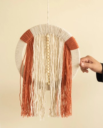  orange and white wall hanging