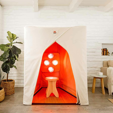  White portable sauna by luminati in brick building