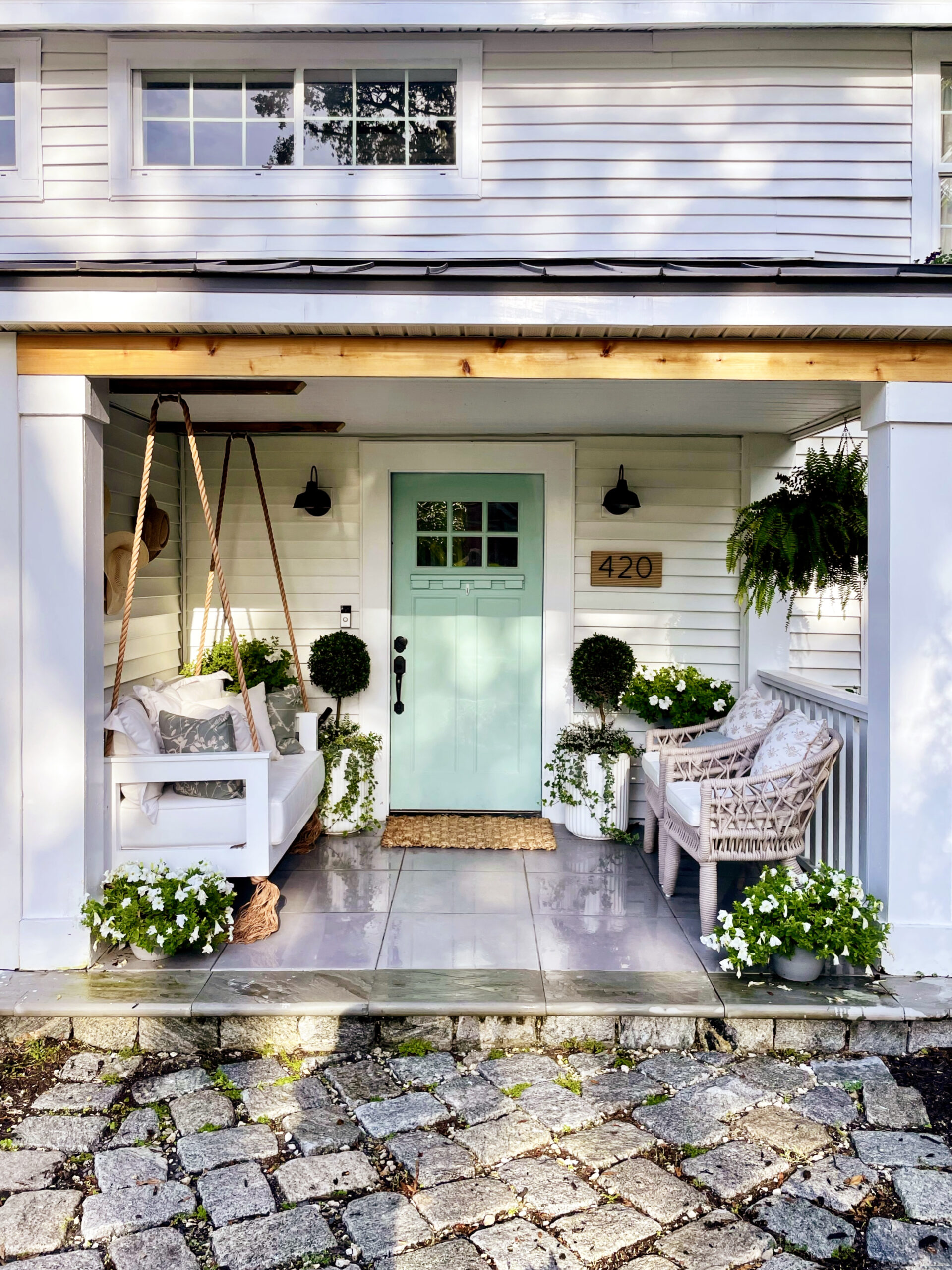 front porch with green door