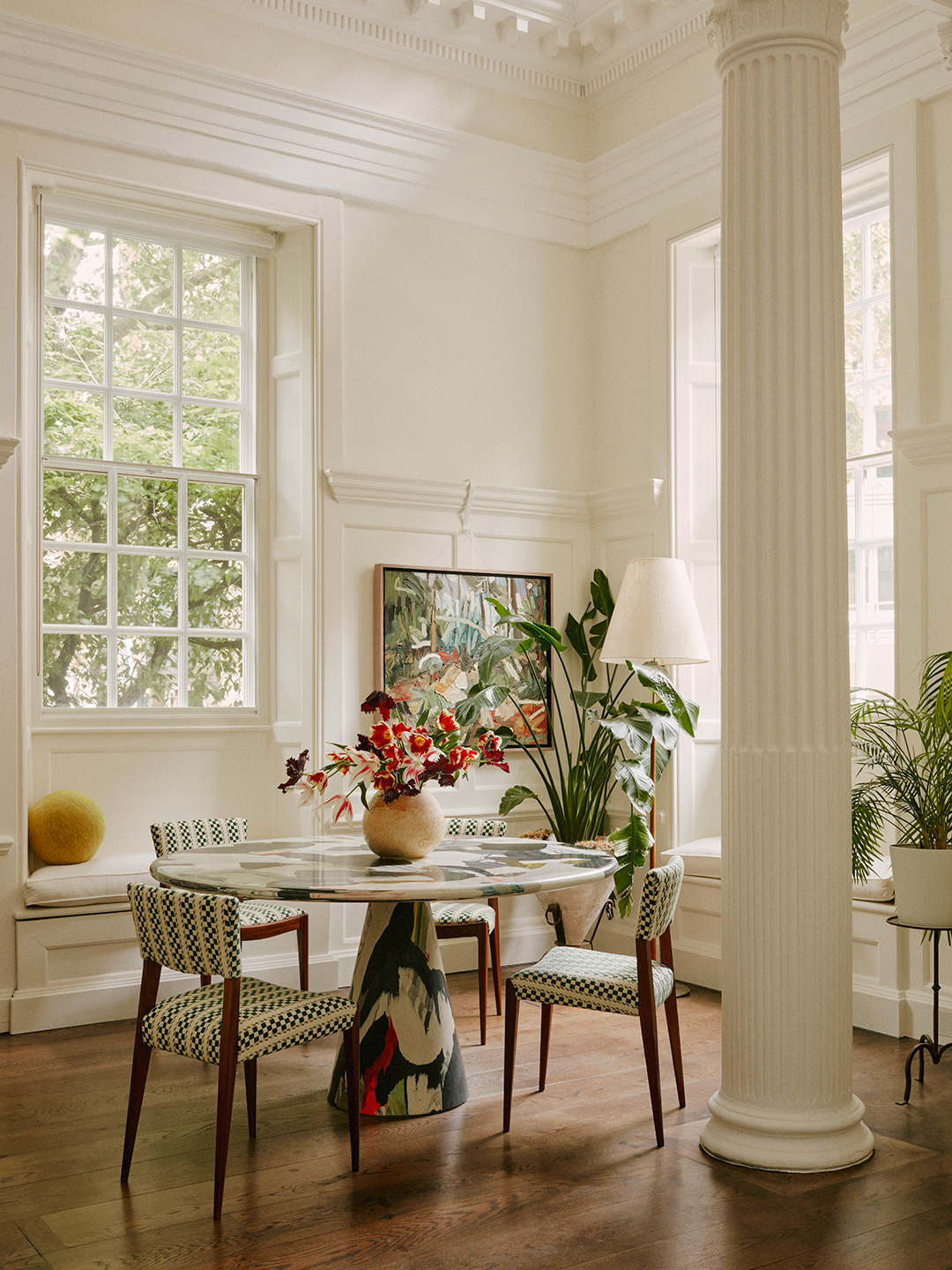 dining table with green checked chairs