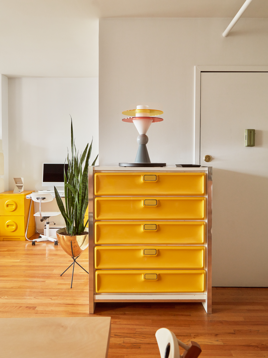 Vintage yellow dresser in entryway