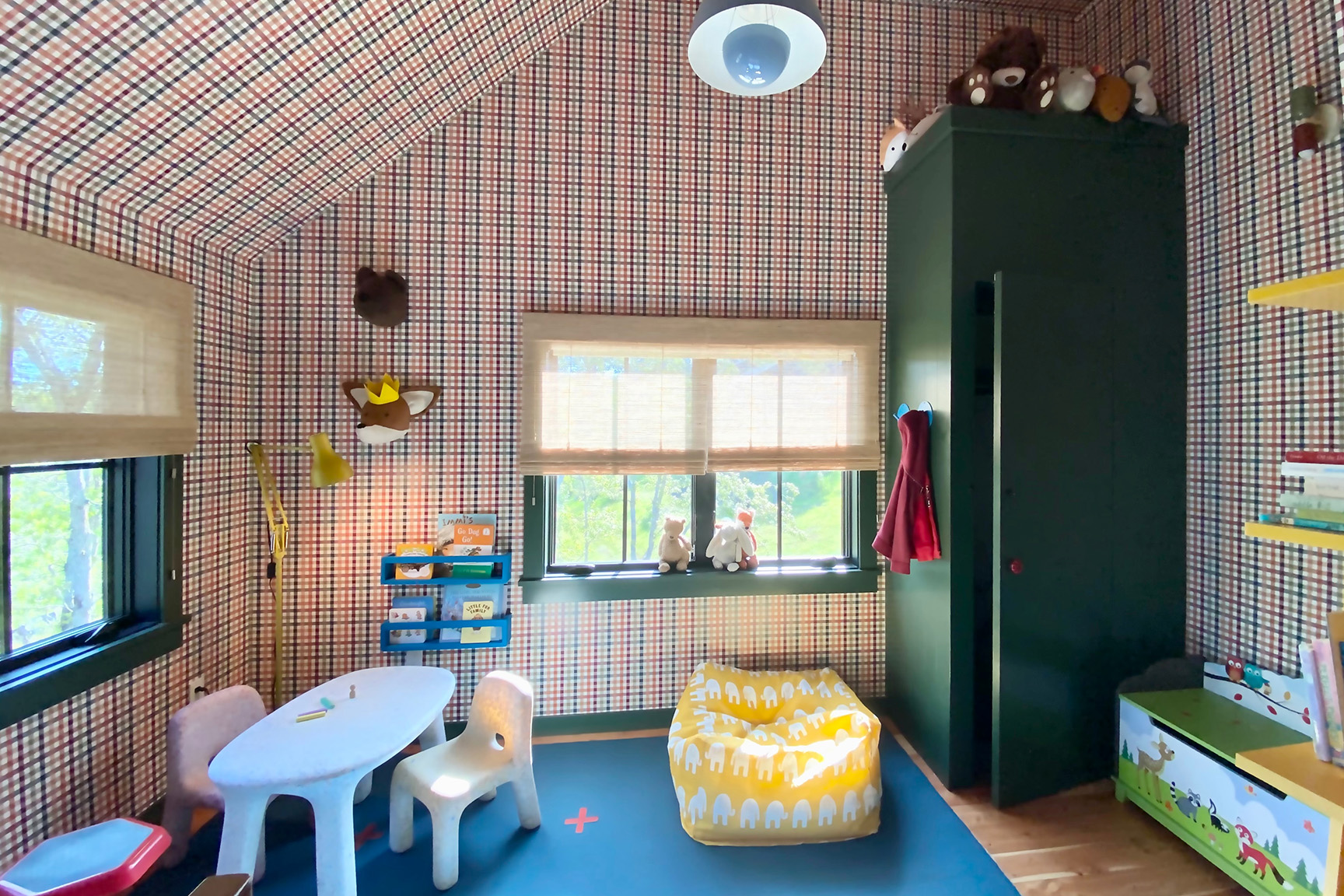 kids playroom with striped wallppaer ceiling