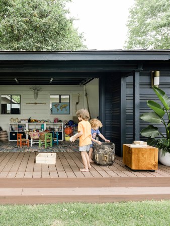 boys running around on playroom deck