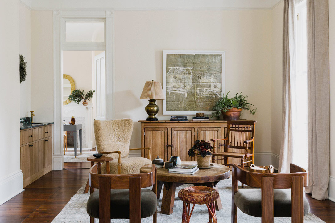 living room with five armchairs