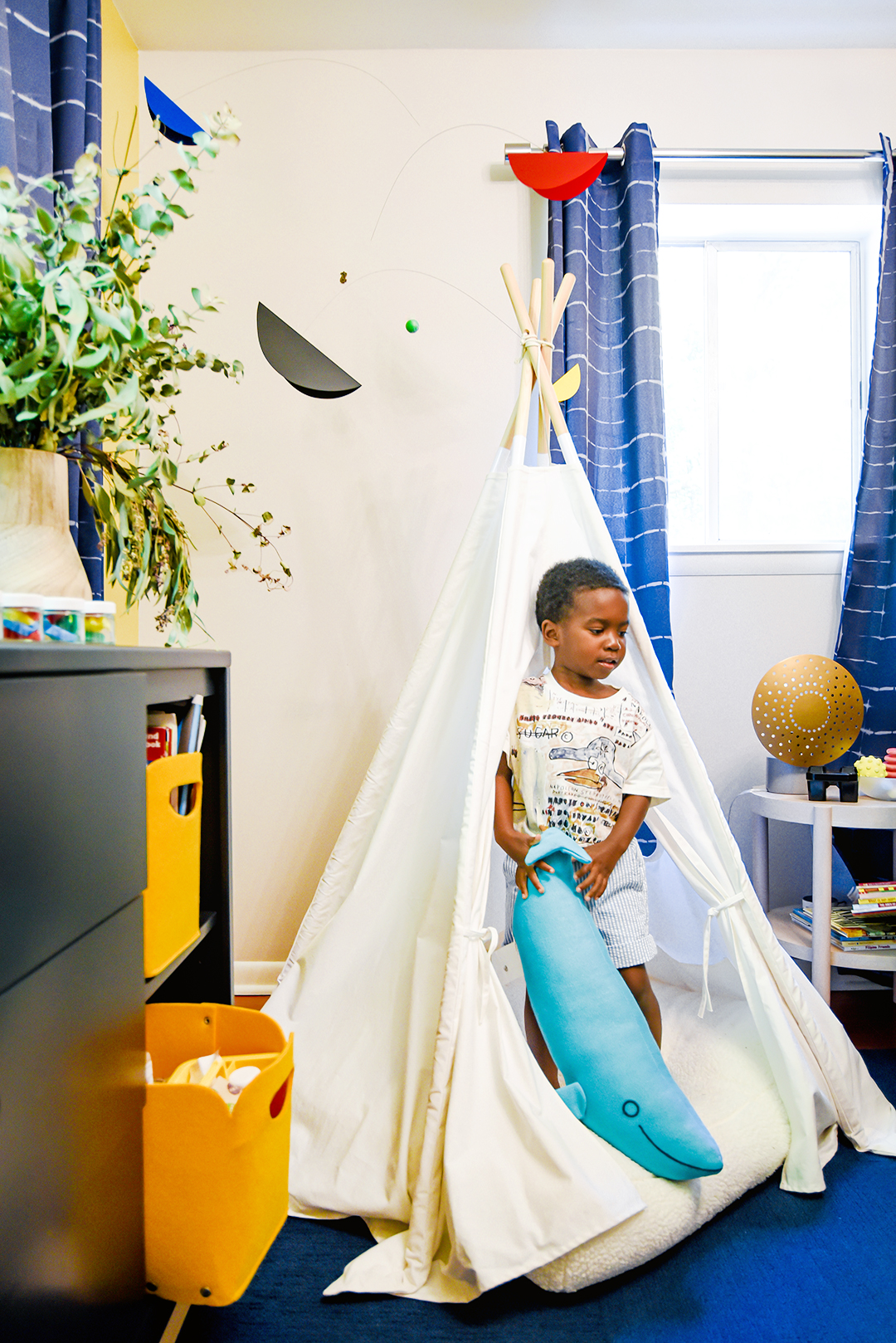 boy in play tent