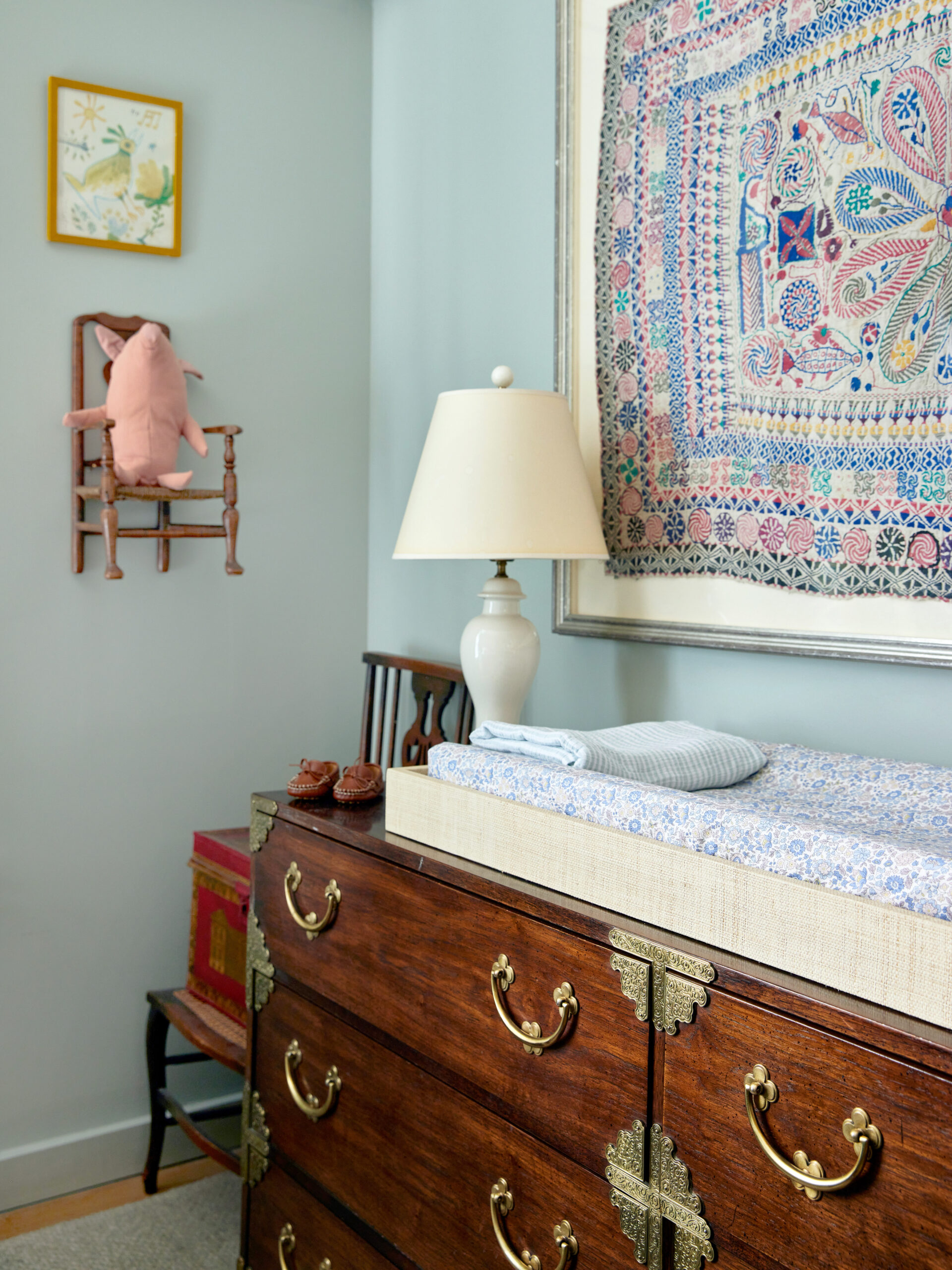 vintage wood dresser used as baby changing table