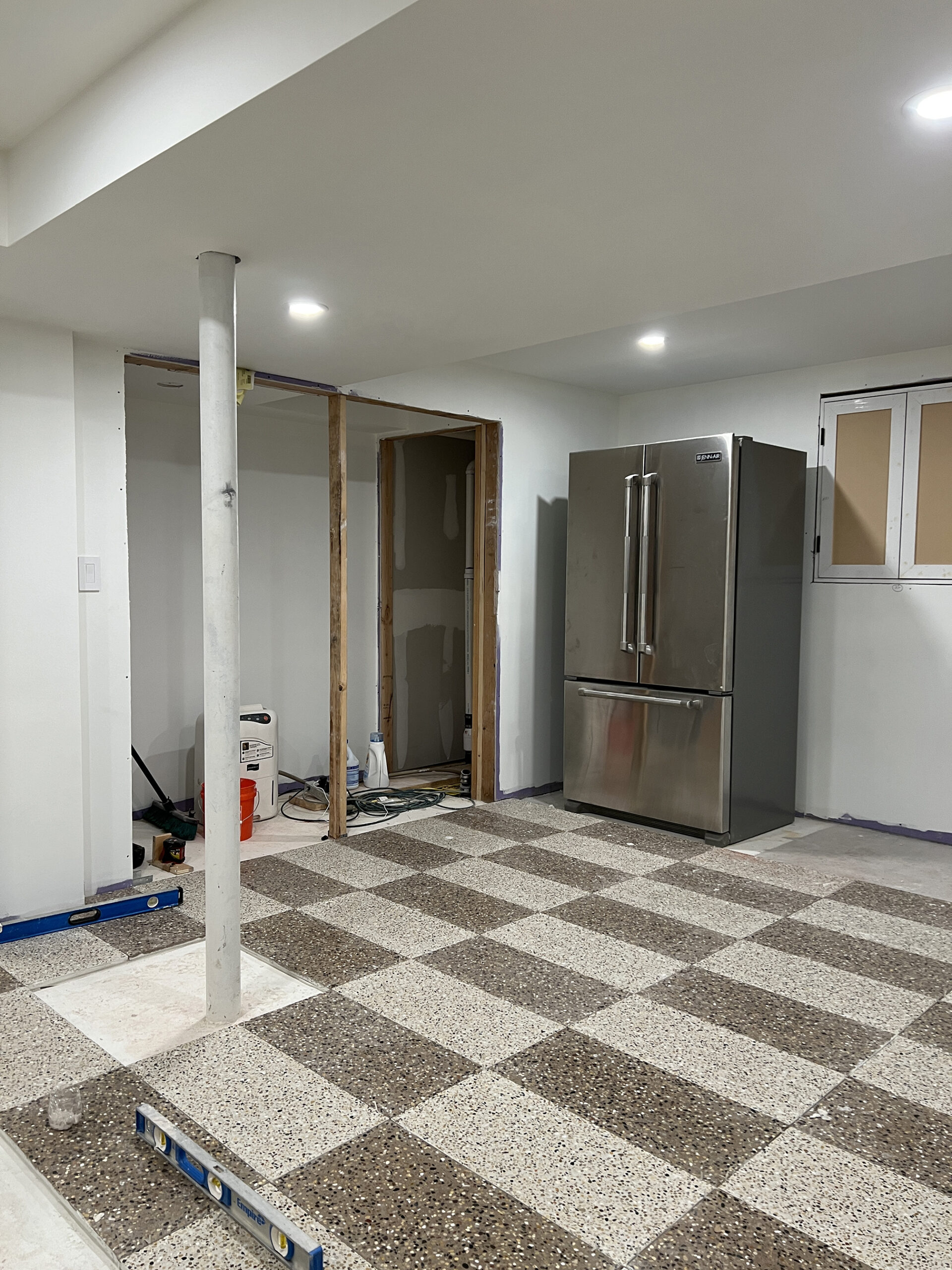 floor tile being installed