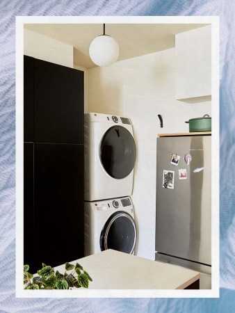 white stacked washer and dryer