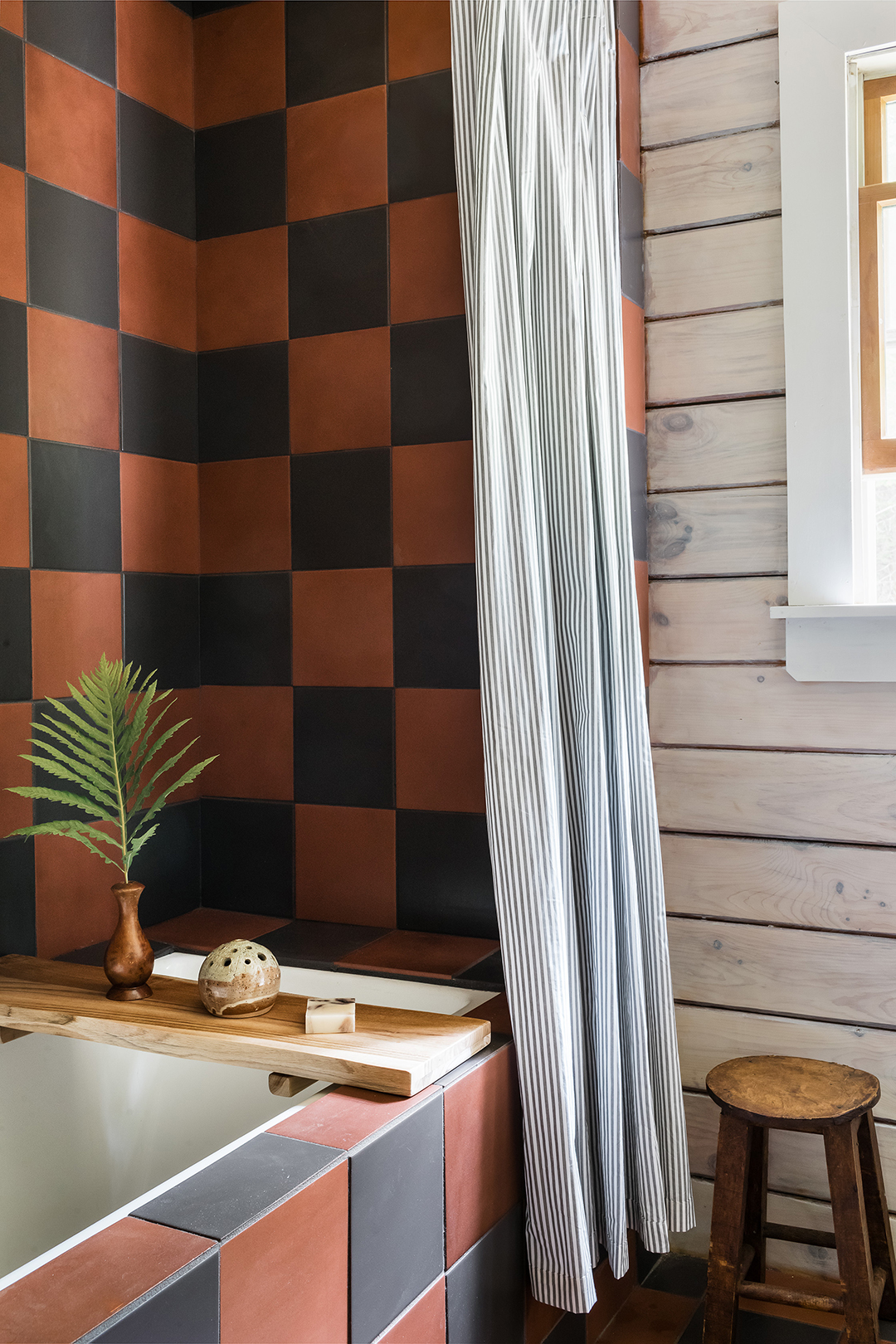 red and black tiled shower